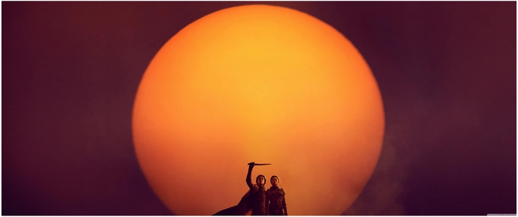 dramatische szene mit leuchtender sonne und figuren