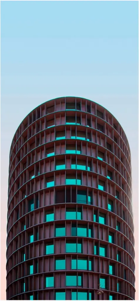moderne architektur eines zylindrischen gebaeudes mit glasfassade