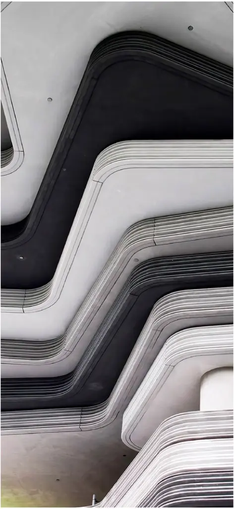 moderne architektur mit geschwungenen linien und grautoenen
