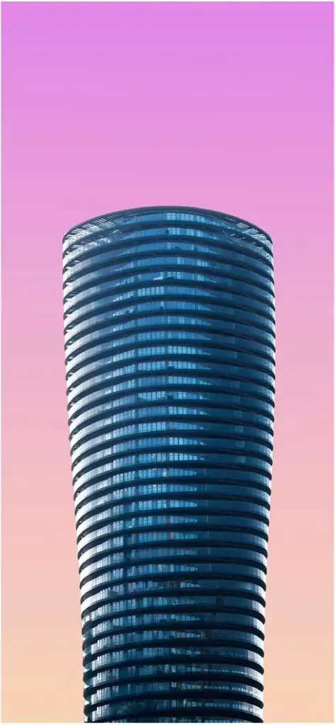 moderner zylindrischer turm mit farbigem hintergrund