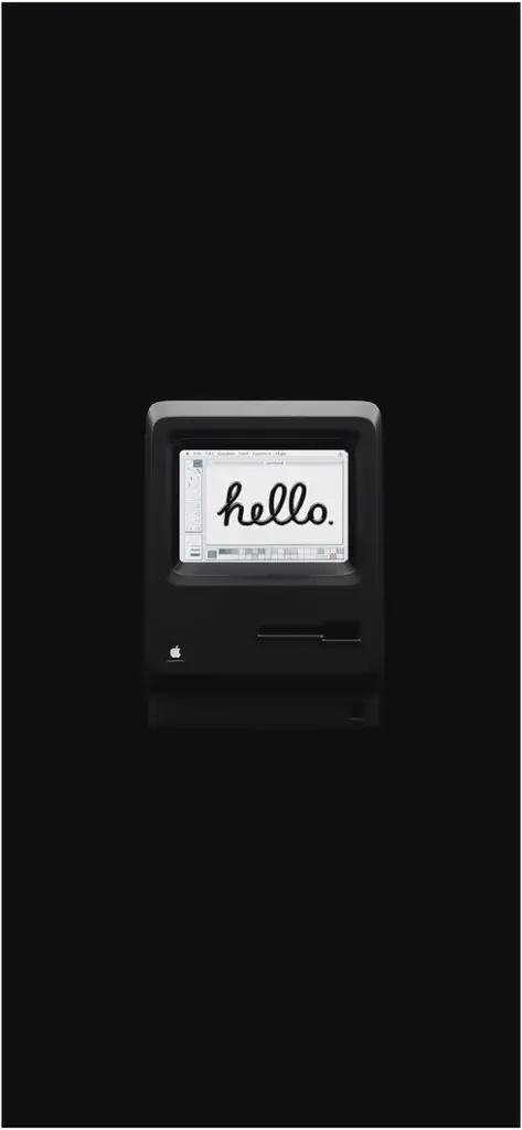 schwarz weisser macintosh computer mit schriftzug hello