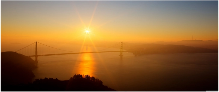 sonnenaufgang ueber golden gate bruecke in natur panoramablick