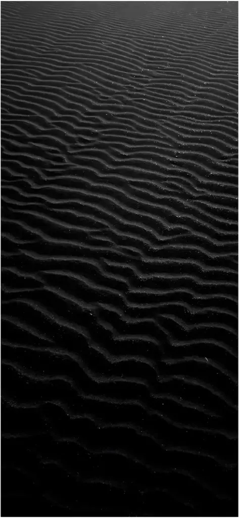 textur von sandduenen in schwarz weiss