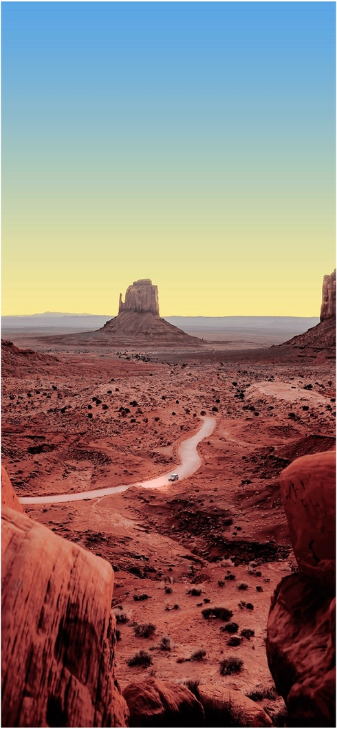 wuestenlandschaft-mit-einem-schmalen-weg-und-felsen
